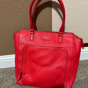 Red Kate Spade bag.
